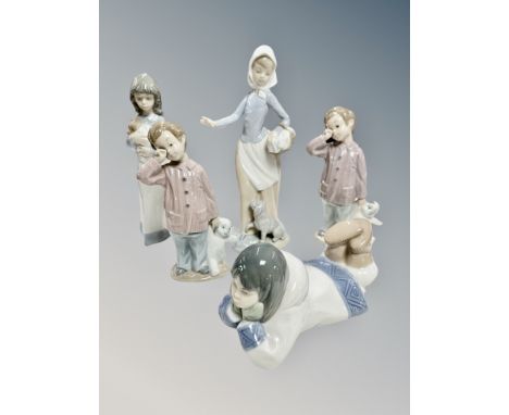 Five Nao figures including an Inuit girl etc