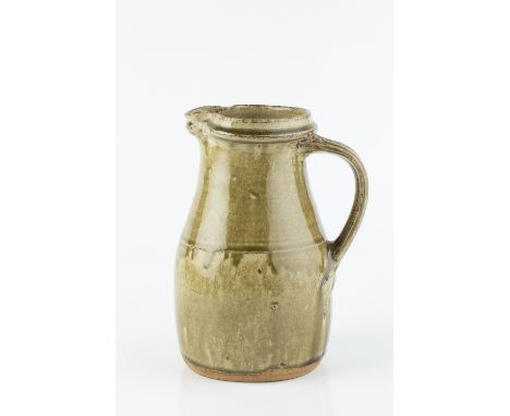 Richard Batterham (b.1936) Jug green ash glaze 22cm high.
