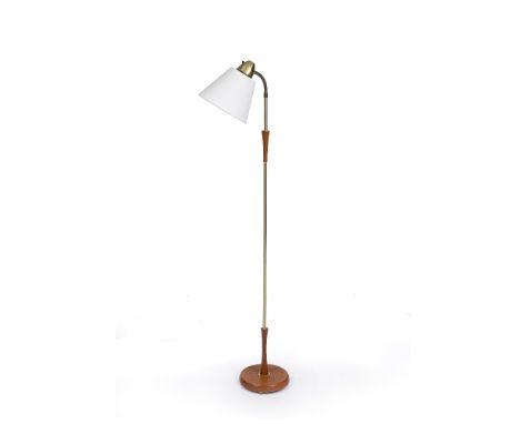 Swedish School Modernist floor lamp adjustable brass neck over circular wooden base 134cm high.