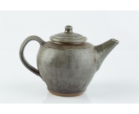 Phil Rogers (1951-2020)  Teapot blue and brown glaze, the body with incised diagonal lines impressed potter's seal  16cm high