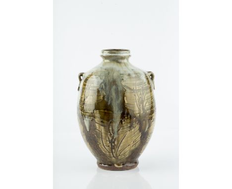 Jim Malone (b.1946) Vase with lug handles and running nuka glaze impressed potter's seal 28cm high.