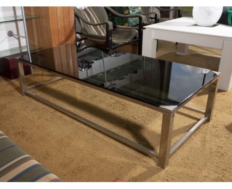 1960s School Coffee table chrome and smoked glass 35cm high, 140cm long, 65cm wide. Provenance:&nbsp;Solar House, Oxfordshire