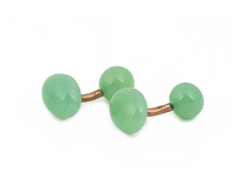 A PAIR OF JADE GREEN GLASS CUFFLINKS With gilt metal central bar 1930s 1.5cm long x 1.2cm wide Condition: Minor signs of wear