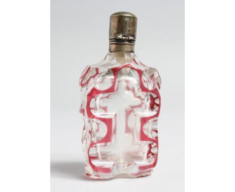 A CUT GLASS, RUBY TINTED SCENT BOTTLE WITH SILVER TOP, 3.5ins high.