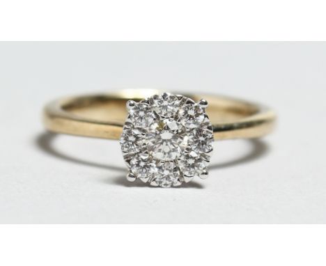 A GOOD 9CT GOLD DIAMOND SET RING