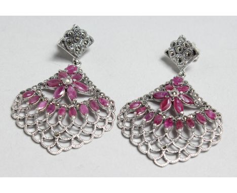 A PAIR OF SILVER, RUBY AND MARCASITE DECO DESIGN EARRINGS.