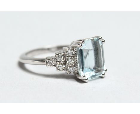 AN 18CT WHITE GOLD, AQUAMARINE AND DIAMOND RING