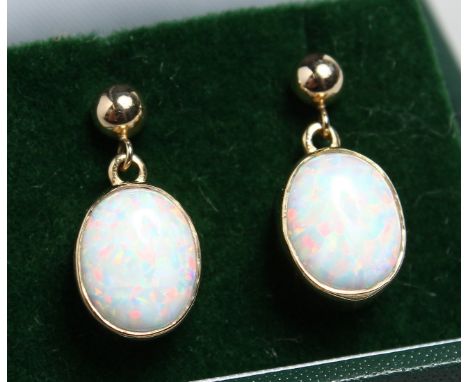 A PAIR OF SILVER AND OPAL DROP EARRINGS