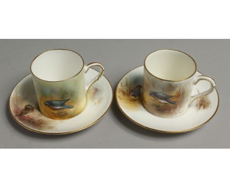 A ROYAL WORCESTER COFFEE CAN AND SAUCER painted with a wood pigeon or a snipe by Jas Stinton. Signed, black mark, and another
