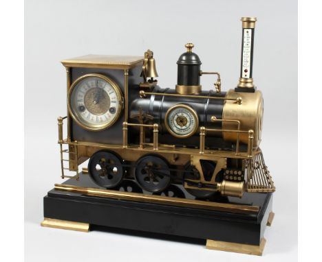 AN UNUSUAL INDUSTRIAL STYLE CLOCK WITH BAROMETER AND THERMOMETER, modelled as a steam train, on a marble base with tracks. 18