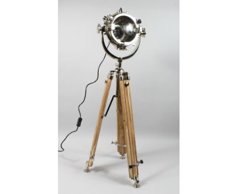 AN INDUSTRIAL STYLE SPOTLIGHT FLOOR STANDING LAMP on tripod base.