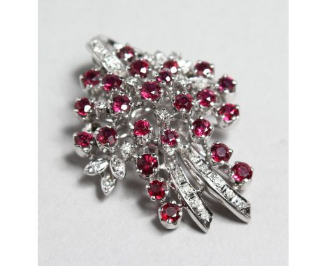 AN 18CT WHITE GOLD, DIAMOND AND RUBY SPRAY BROOCH, 1.5ins.