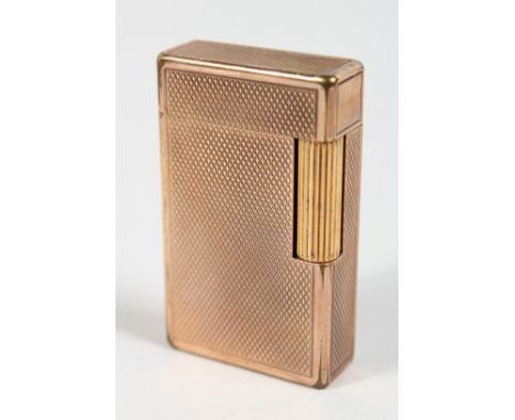 A DUPONT GILT LIGHTER, No. 5388, 2.25ins in original box.