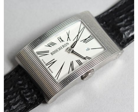 A GOOD 18CT WHITE GOLD BOUCHERON WATCH with leather strap, no. 090 6233.