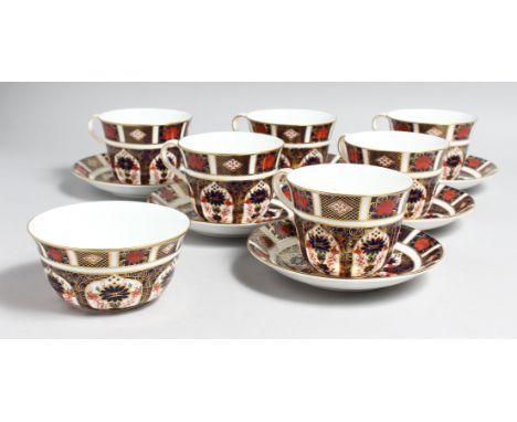 A SET OF SIX LARGE ROYAL CROWN DERBY OLD IMARI PATTERN CUPS AND SIX SAUCERS, NO. 1128 and a spare cup(13).