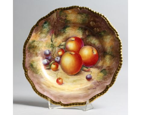 A ROYAL WORCESTER PLATE painted with fruits by SIBLEY LEWIS with gilt gadrooned border