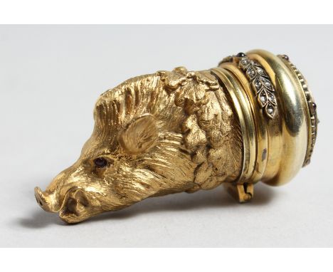 A VERY GOOD RUSSIAN SILVER GILT BOARS HEAD SNUFF BOX, with inset enamel decoration and precious stones, 2.75ins long.