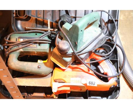 Shelf of mixed electrical tools including Black and Decker scorpion saw. Not available for in-house P&P.Condition Report: All
