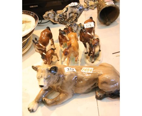 Group of mixed ceramic horses, cheetah and a lioness. Not available for in-house P&amp;P. 
