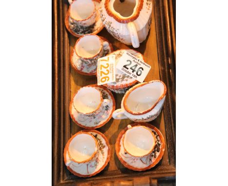 Child's decorative ceramic tea set on a small Edwardian type tray. Not available for in-house P&amp;P. 