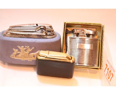 Three vintage lighters including boxed Ronson Cadet. P&amp;P Group 1 (£14+VAT for the first lot and £1+VAT for subsequent lot