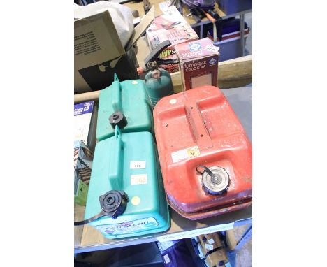 Shelf of mixed items including three petrol cans, gas lights and Halon extinguisher. Not available for in-house P&amp;P. 