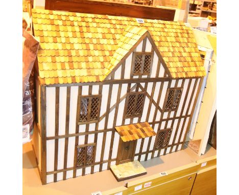 Vintage style dolls house with a quantity of dolls house furniture. Not available for in-house P&amp;P. 