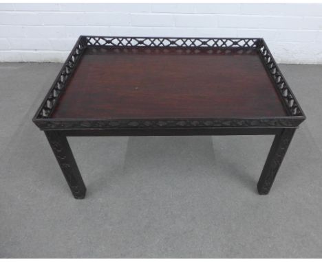 Chinese Chippendale style mahogany low table, the rectangular top with a pierced gallery over a blind fret frieze and fret ca