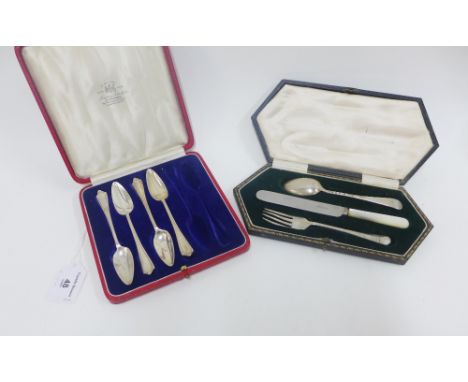 Edwardian silver christening cutlery set comprising a silver fork and spoon and a Stainless steel knife, Hamilton &amp; Inche