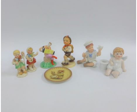 Various pottery and porcelain figures to include Hummel, etc, tallest 11cm (7)