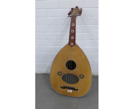 A vintage lute with gourd inlaid back, 85cm long 