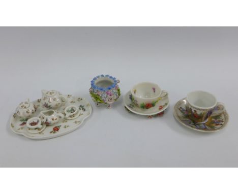 Miniature Sitzendorff porcelain cup and saucer, Dresden cup and saucer and a miniature Limoges porcelain teaset with tray (a 