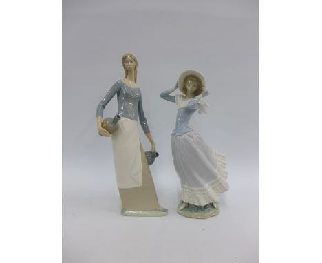 Lladro porcelain figure of Lady wearing a bonnet hat and a Nao figure of a Water Carrier, tallest 39cm (2) 