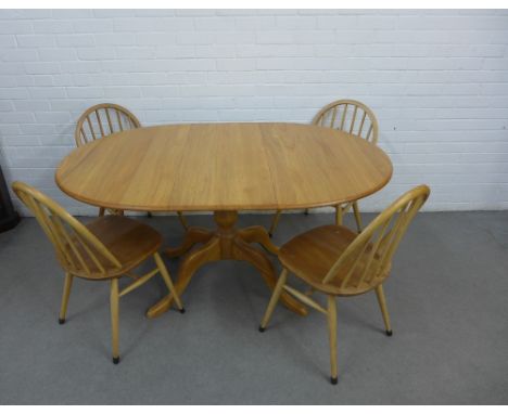 Ercol light elm dining table and set of four chairs, 149 x 73 x 98cm (5)