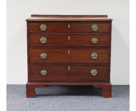 A George III mahogany chest of four long drawers, on bracket feet, 86.5cm wide