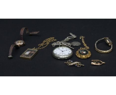 A lady's 9ct gold cased wristwatch, the circular dial with silvered chapter ring and Arabic numerals, a lady's 9ct gold cased