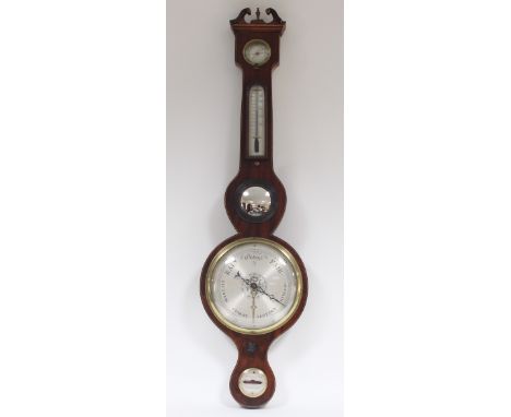 A mahogany cased wheel barometer, with dry/damp dial, thermometer and silvered dial with scale from 28-31, 95cm high