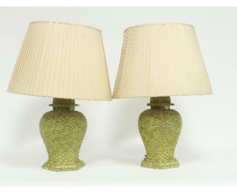A pair of pottery lamp bases of baluster form with scale surface