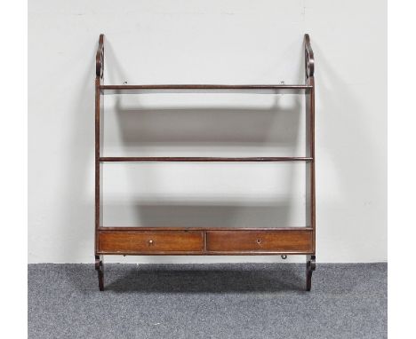 A set of mahogany wall shelves, the bottom shelf fitted two drawers, 59cm wide