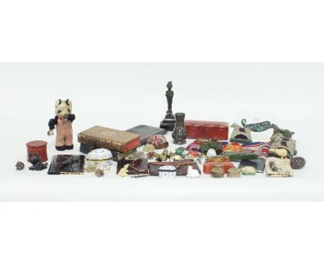 An interesting collection of sundries including small carved animals, tortoiseshell box, trinket boxes, enamel badges, 12th R