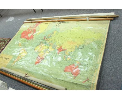 Two roller world maps, circa 1920, and three metre rulers