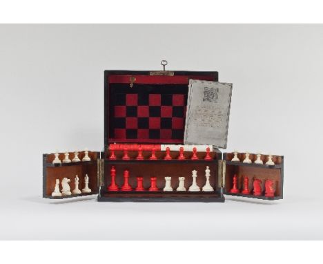 A 'Royal' Cabinet of Games with chess, draughts, cribbage and a racing game, all in a walnut box, 33cm wide/see illustration