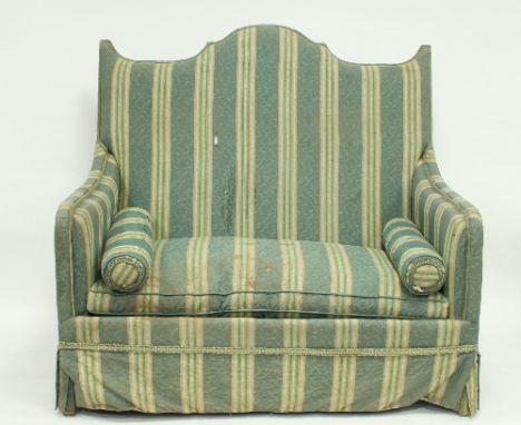 A French arch back sofa with loose seat and squab cushions