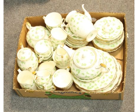 An extensive Aynsley tea and coffee service decorated clover