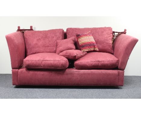 A Knole type sofa covered in crimson damask with loose seat and back cushion, 193cm