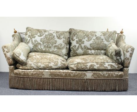 A Knole type sofa covered in taupe brocade, fitted a loose seat, back and squab cushions, 225cm wide