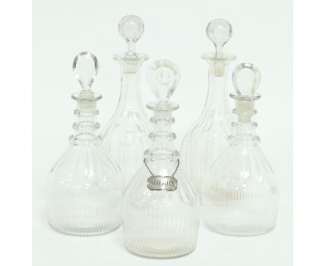 A pair of 19th Century triple ring neck decanters, another similar with silver Sherry label and a pair of decanters Condition