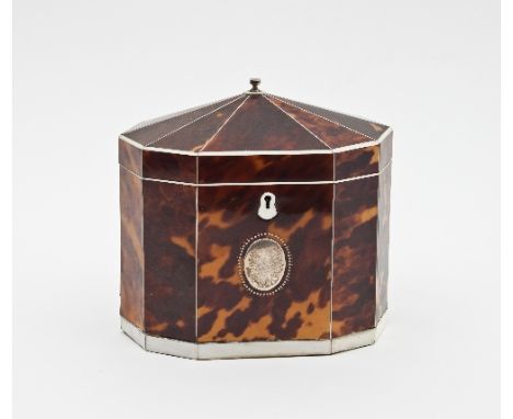 A George III tortoiseshell and ivory tea caddy, circa 1790, with ten sides, domed lid and two inner lids/see illustration Con