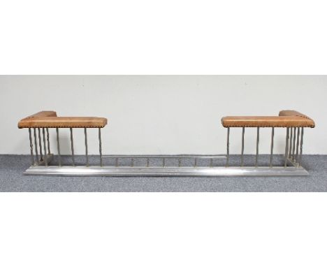 A large club fender with padded top rail and brass mounted steel supports, 258cm wide overall, internal measurements at heart