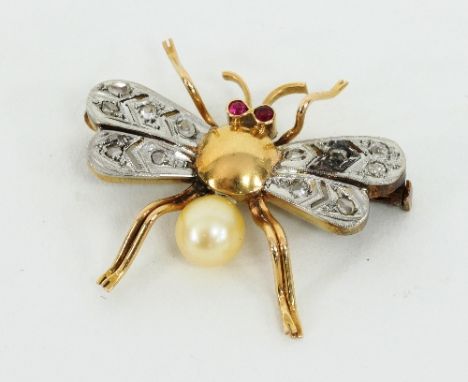 A Victorian diamond, ruby and pearl fly brooch set in gold